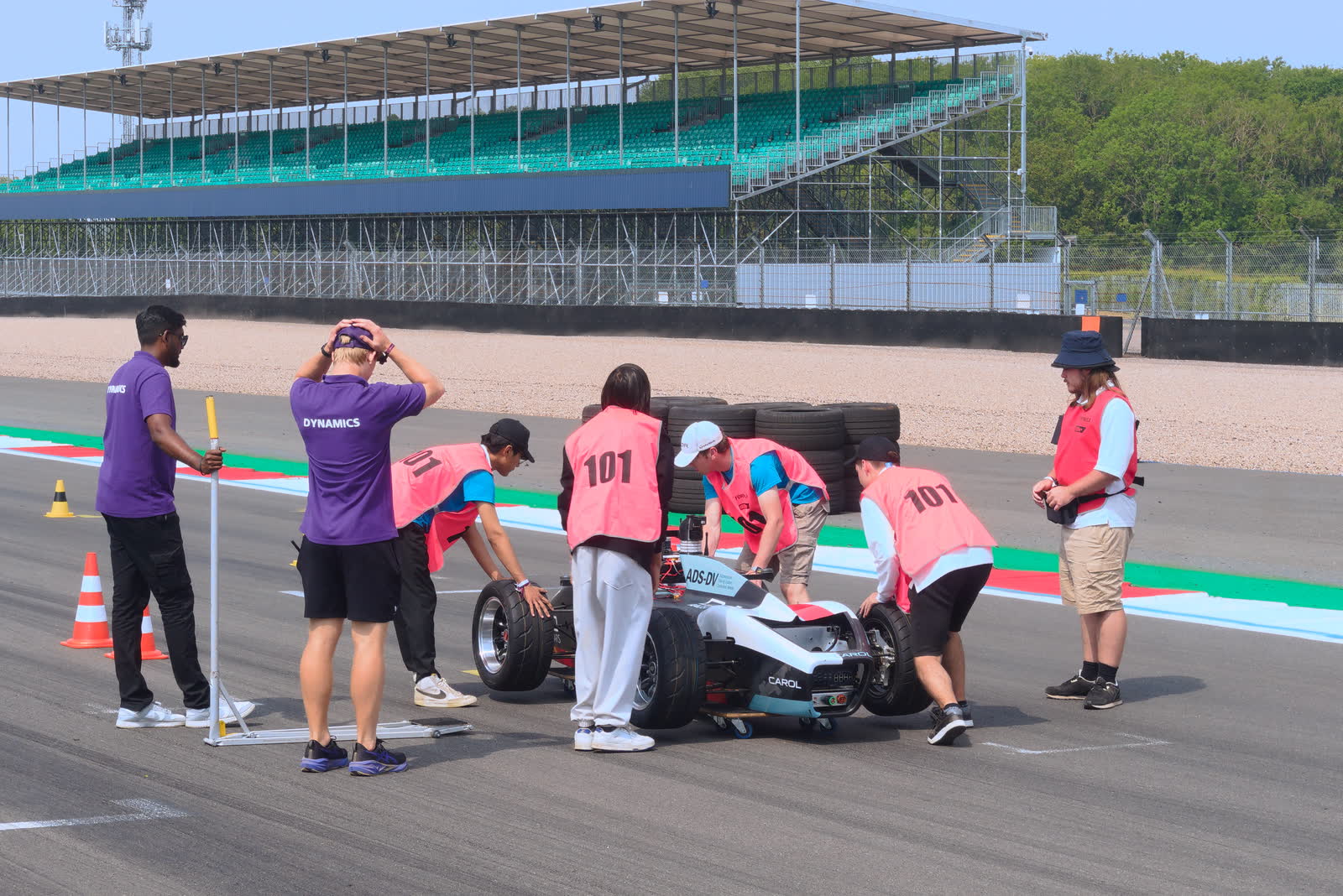 UH Racing Autonomous fitting the compute to the car on the circuit at Silverstone