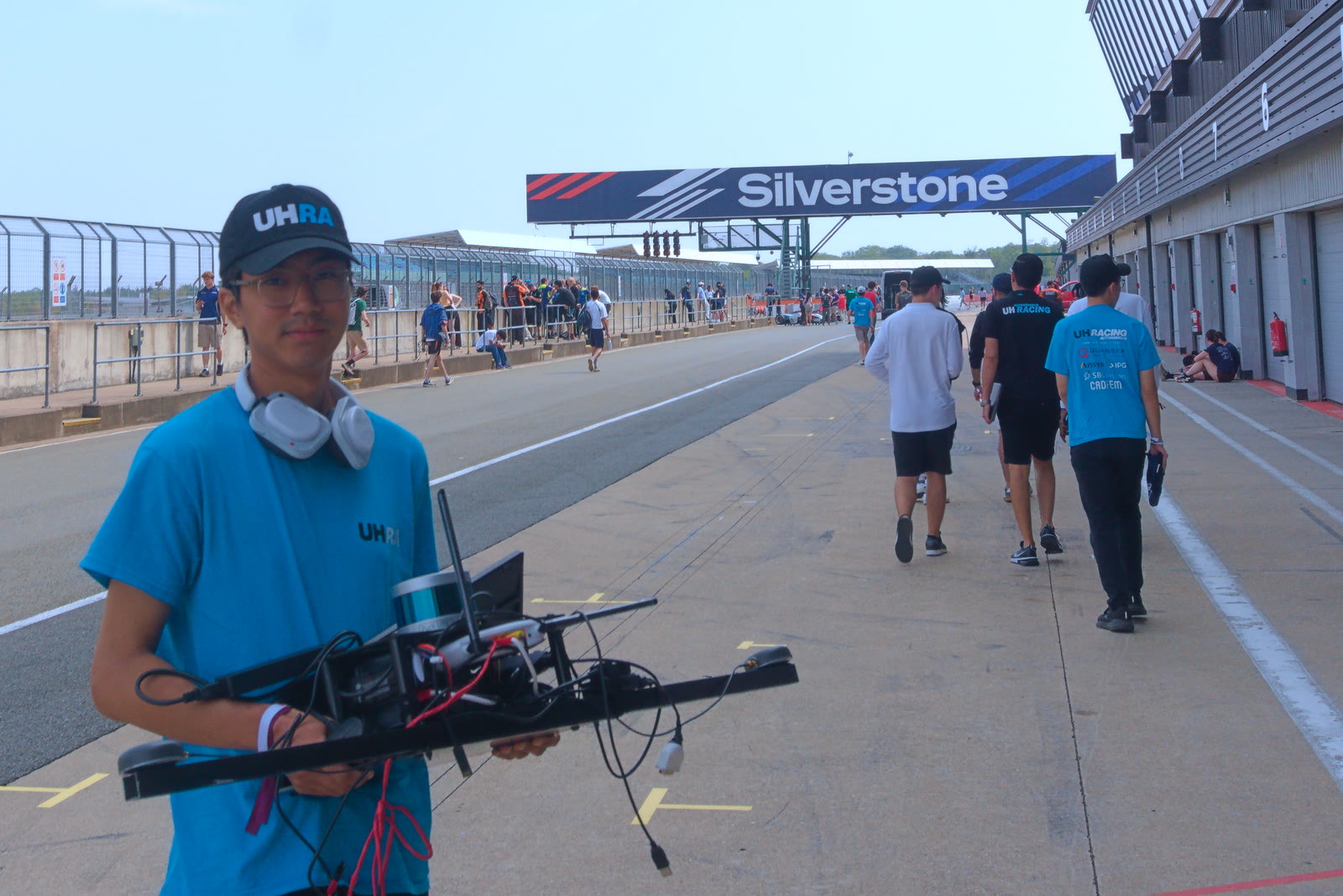 Carrying the assembled sensor rig up the pit lane at Silverstone